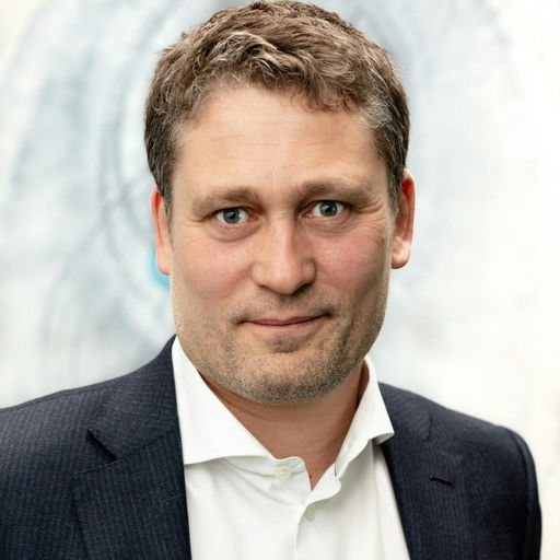 Dr. Lars Frolund